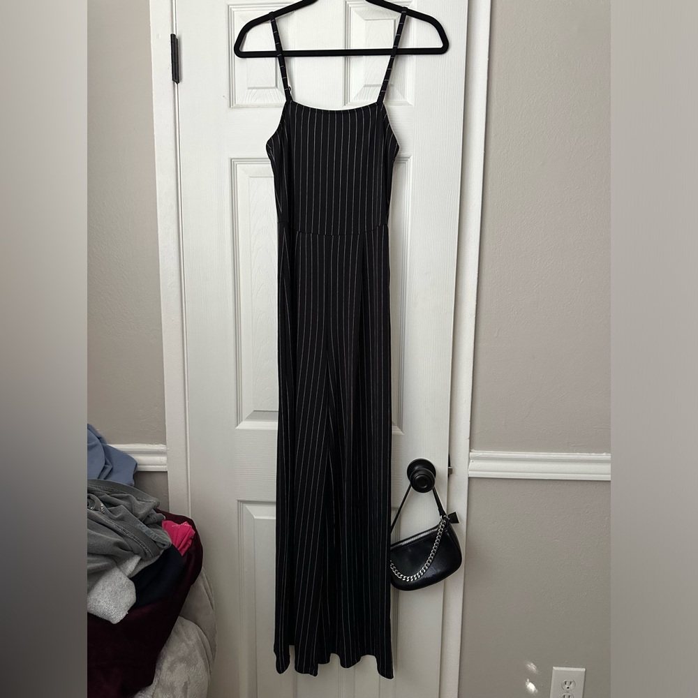 Small Forever 21 black & white striped jumpsuit